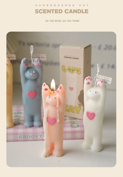 Raise your hand cat candle